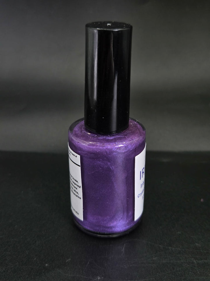 Iris Violet Pearl by Irilune, violet shimmer nail polish in a bottle with a black cap.