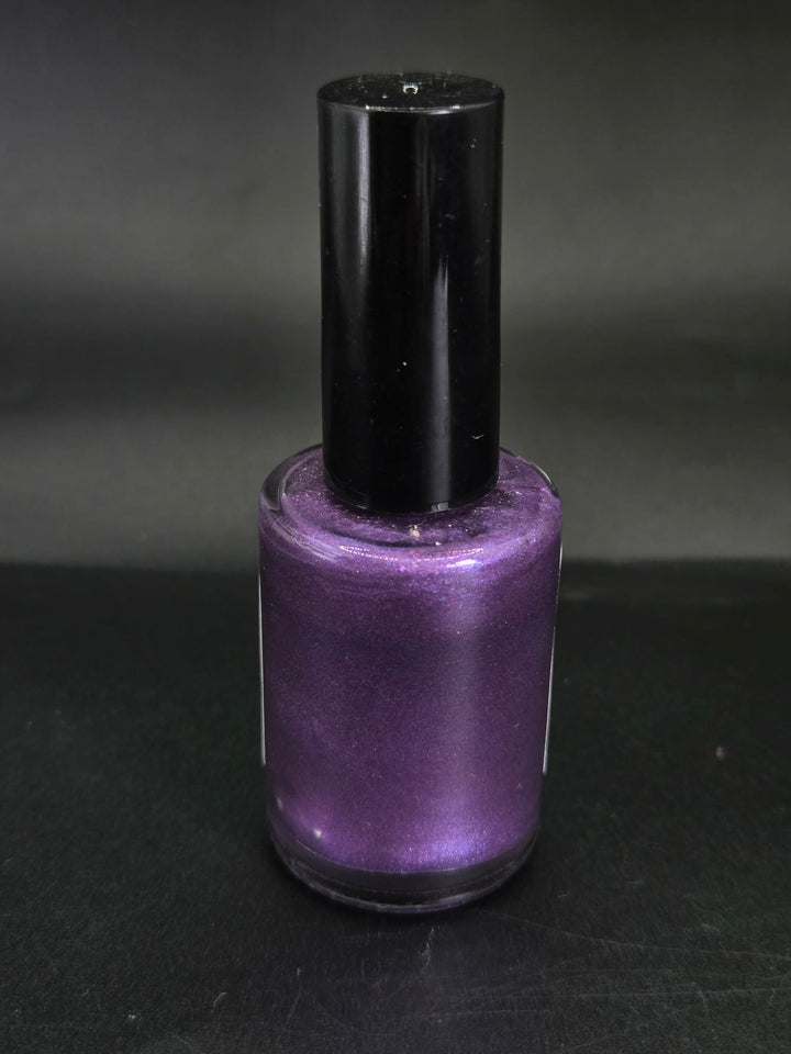 Velvet Amethyst by Irilune, purple shimmer nail polish in a bottle with a black cap.
